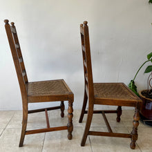 Load image into Gallery viewer, Pair Of Antique Arts And Crafts Oak Ladder Back Dining Chairs With Rush Seats.